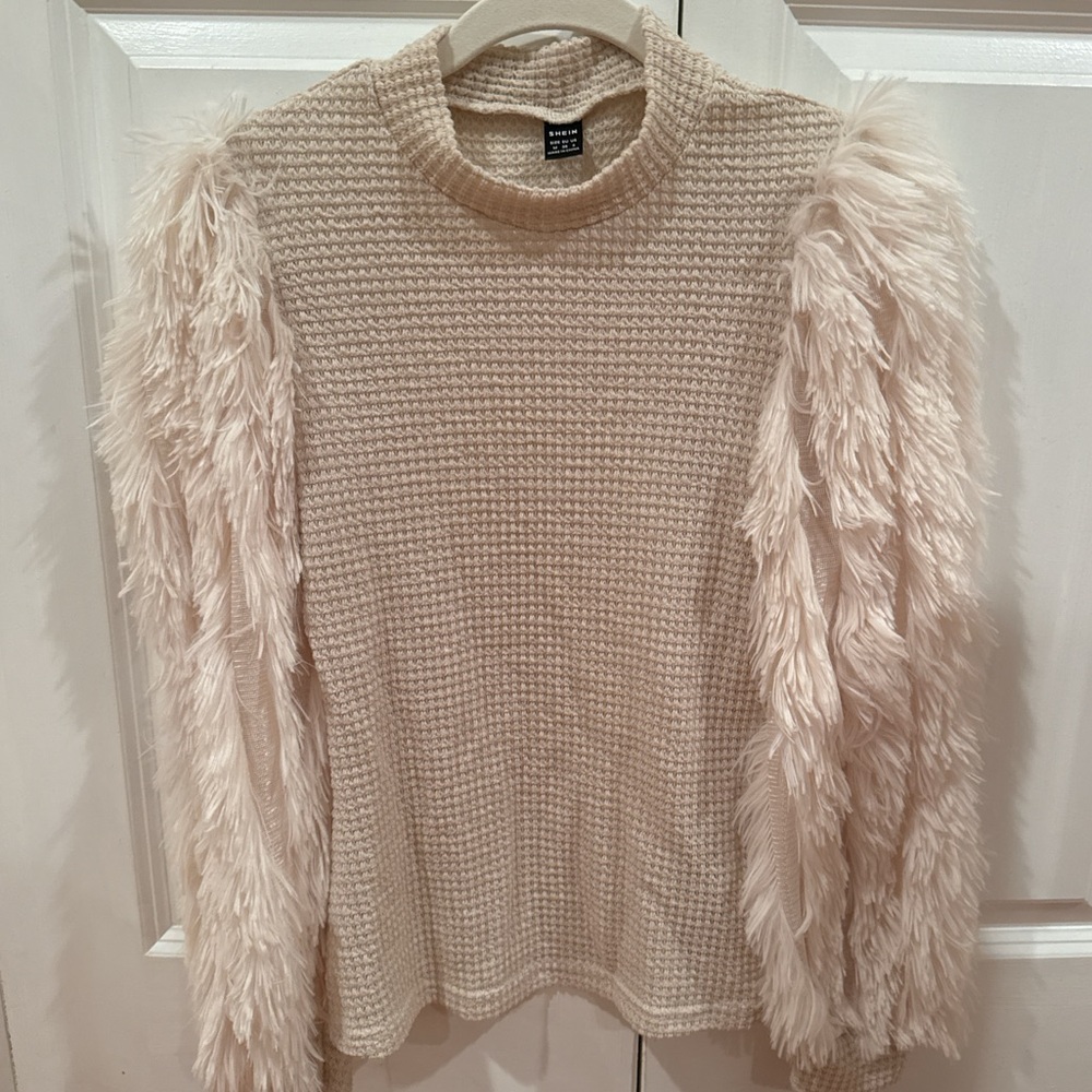 Tan sweater with fur sleeves